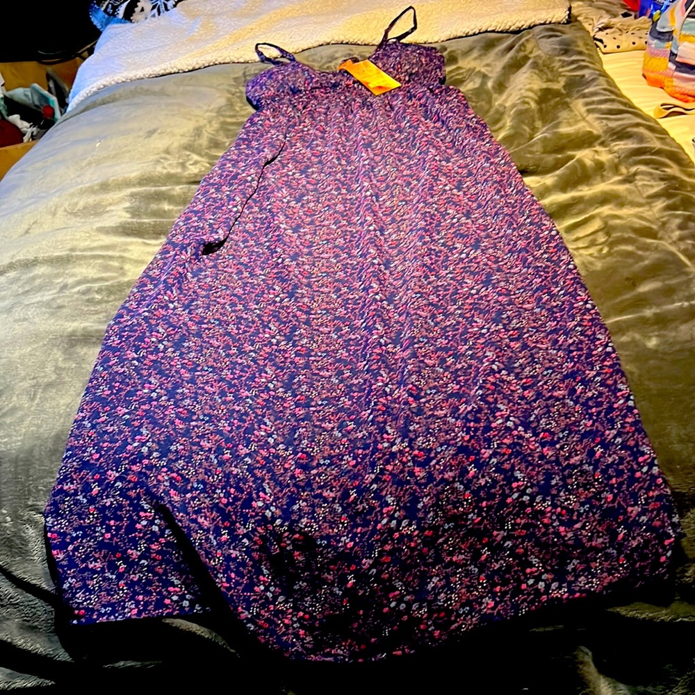 Large, women's, casual, floor length dress.